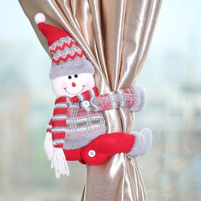 Lightweight plush curtain holder with flexible wraparound limbs for easy placement