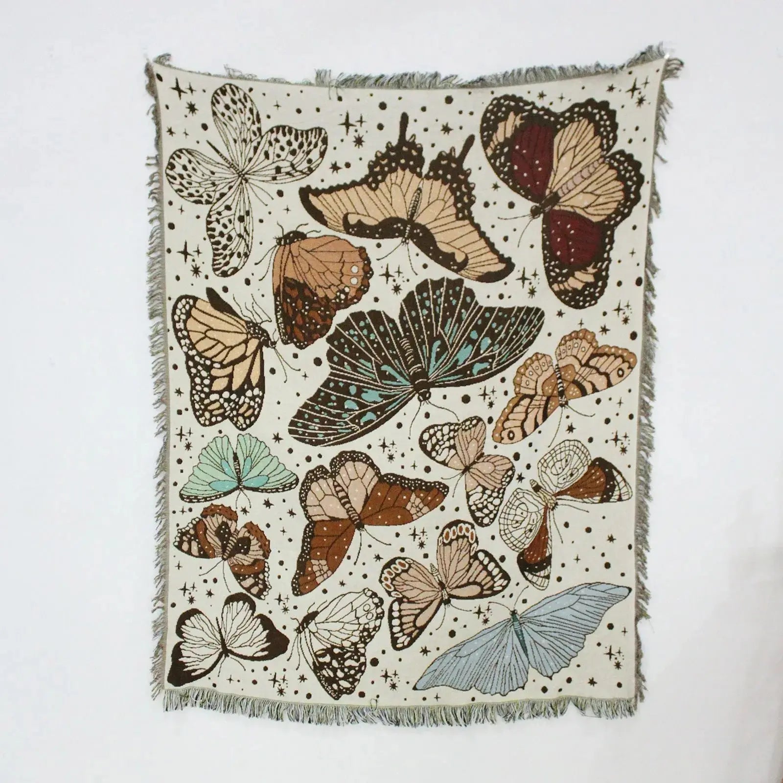Blanket with butterfly designs on a white background