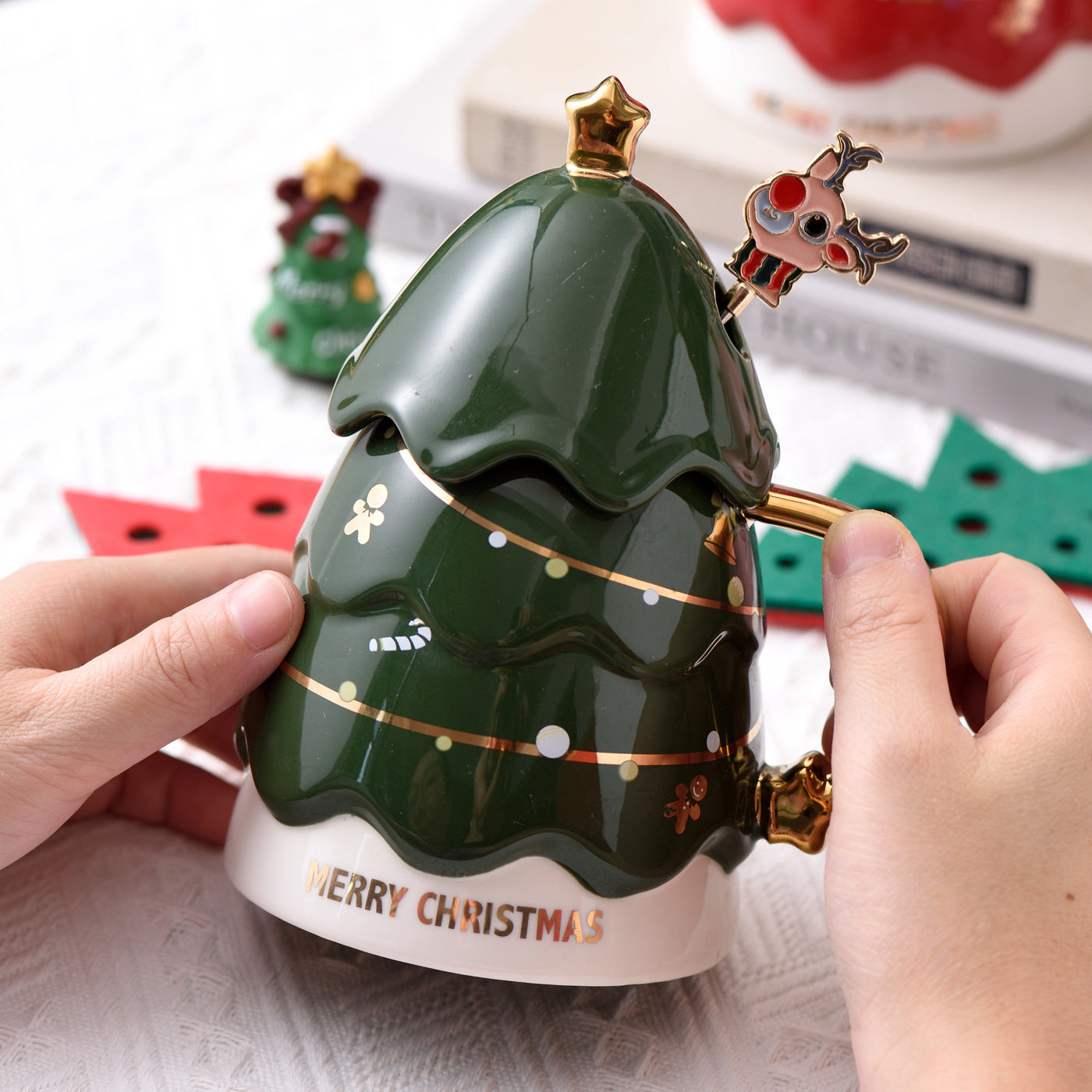Christmas drinkware with tree topper lid and metal spoon in holiday gift packaging