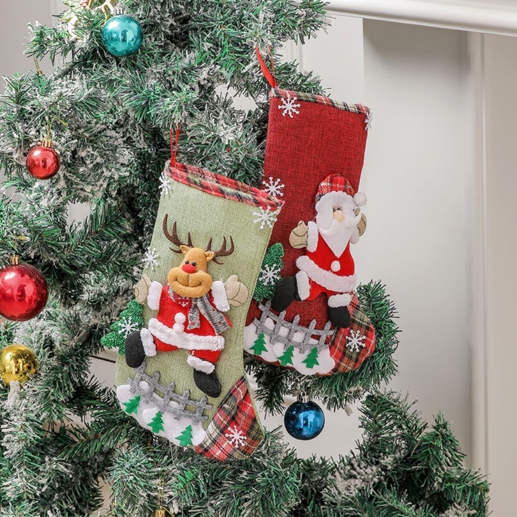 Holiday gift bag with textured cloth appliqué and dimensional character design