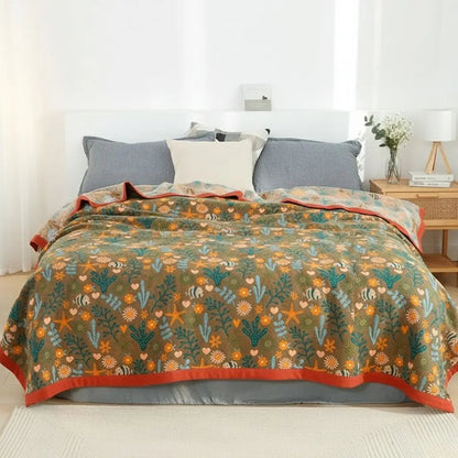 Cotton gauze throw with layered design construction providing comfort and breathable bedding