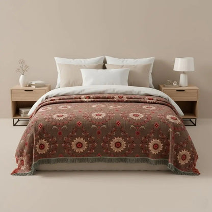 Floral pattern cotton blanket featuring intricate woven design and decorative textile details