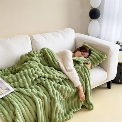 Textured polyester flannel blanket with heavy weight construction for comfort