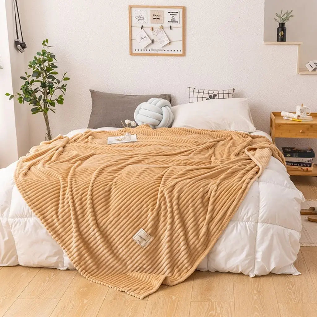 Quality fleece throw with smooth finish and substantial weight for versatile layering bedding