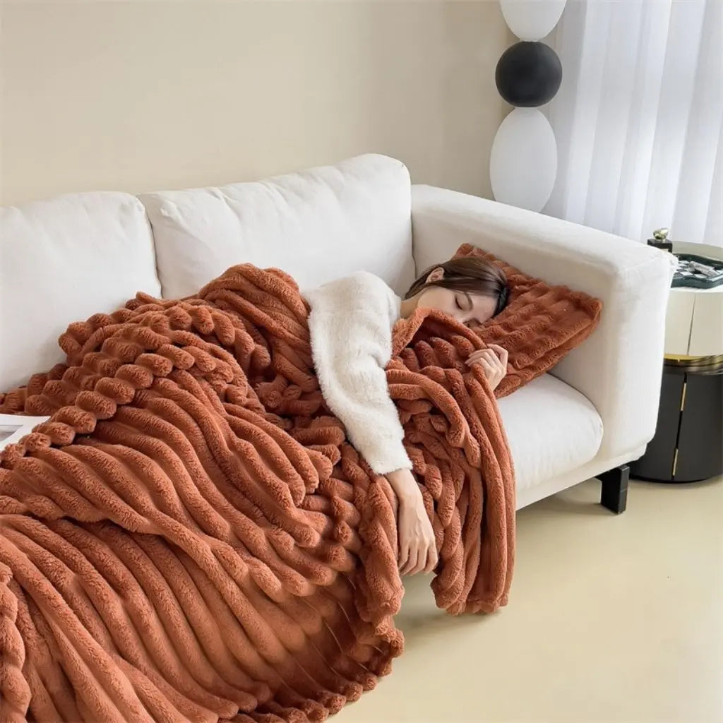 Textured polyester flannel blanket with heavy weight construction for comfort