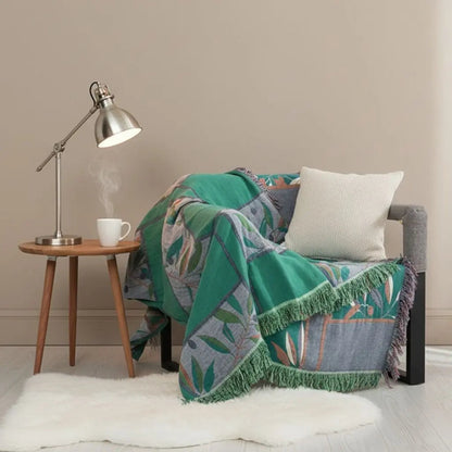 Lightweight cotton throw displaying fish pattern ideal for coastal style interiors