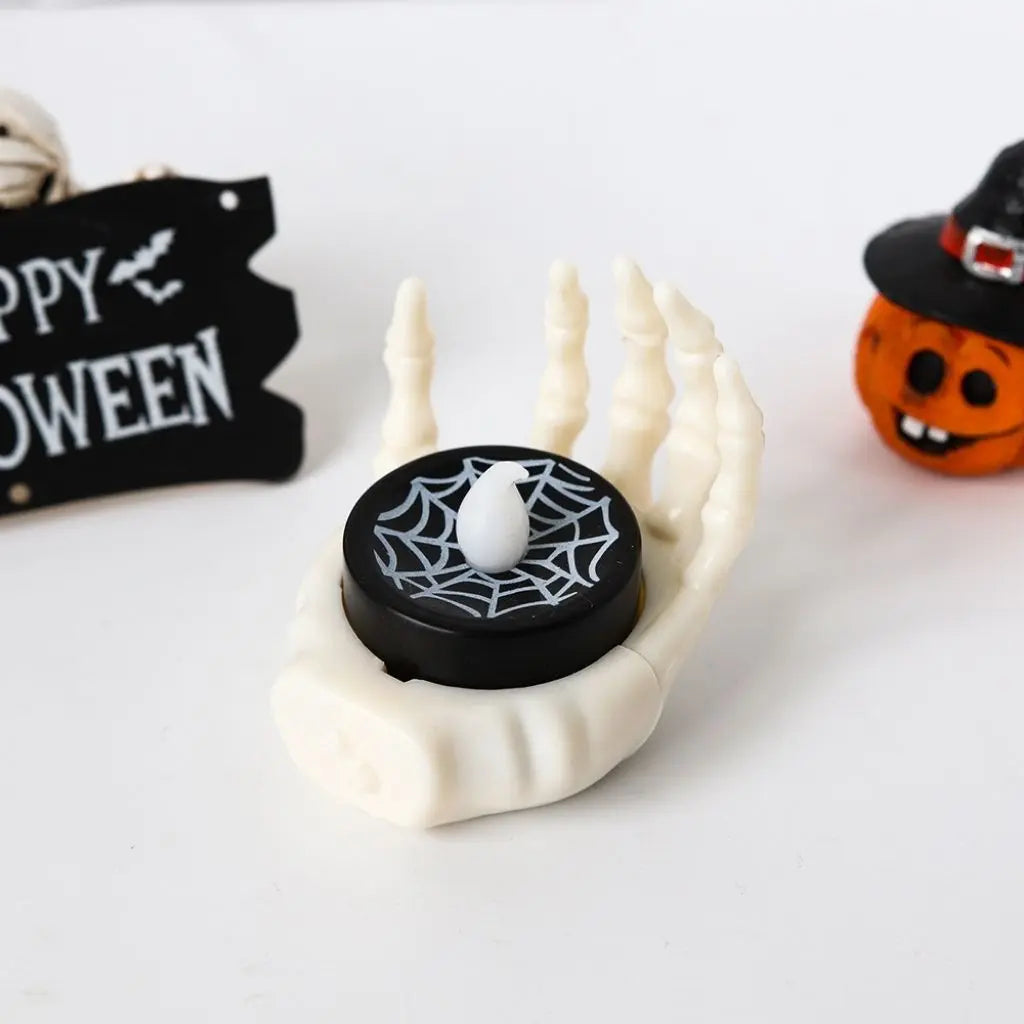 Halloween-themed LED lamp with spider web design on a white background