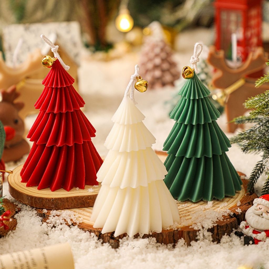 Decorative Christmas candle with layered spiral tiers and natural wax blend finish