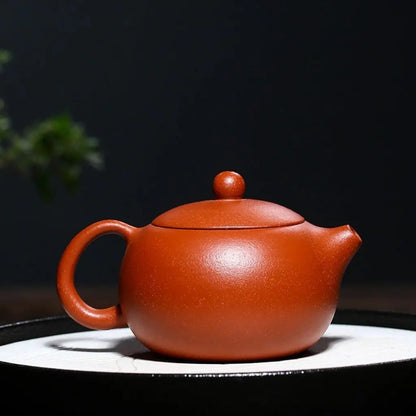 Complete red clay ceramic teapot set, handcrafted traditional design ideal for tea lovers and gift giving