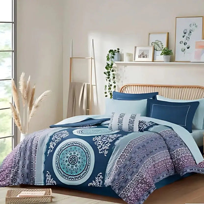 Embroidered pillow shams and decorative pillows from boho comforter set with matching medallion patterns