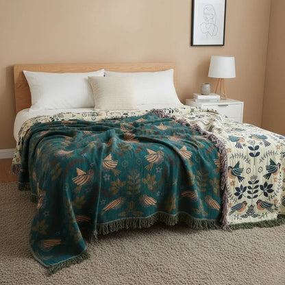Breathable cotton botanical sofa throw with bird motif for multi-purpose home use