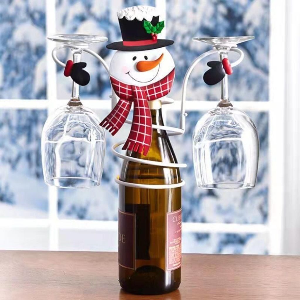 Wine glass craft with green Christmas tree design and gold star topper