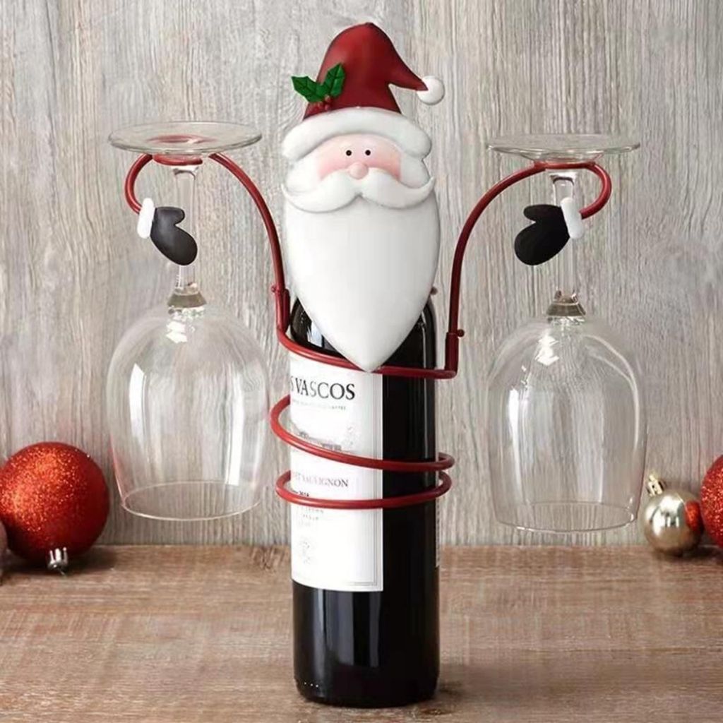 Set of four Christmas wine glass decorations with Santa snowman reindeer designs