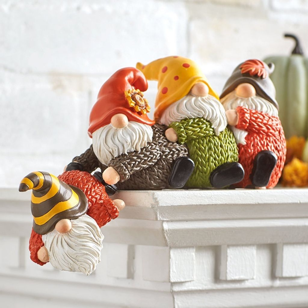 Resin Christmas dwarf with red outfit and white beard for holiday shelf display