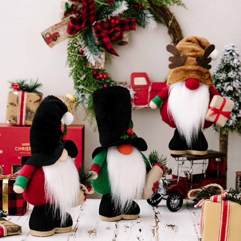 Holiday gnome doll with whimsical beard and soft cloth exterior for shelf decoration