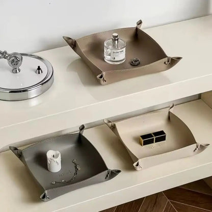 Compact faux leather organizer tray showing dual size options for desktop and dresser storage solutions