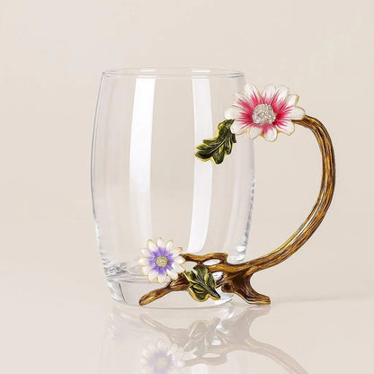  Clear glass tea cup with hand-painted botanical design and metallic gold accent handle