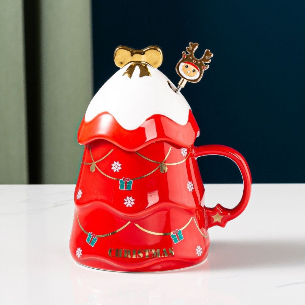Pink glazed mug with Christmas themed graphics and coordinating lid