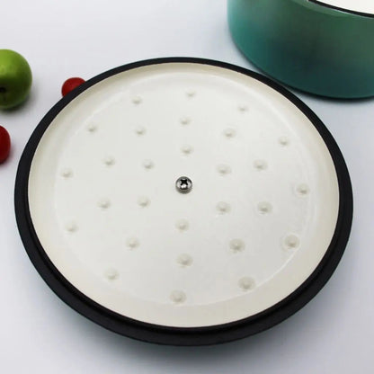 Non stick ceramic coated interior of cast iron soup pot showing smooth surface for easy cleanup and cooking