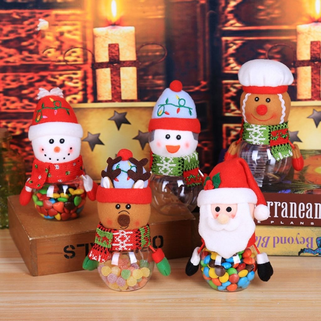 Christmas treat jar featuring character topper and transparent candy storage compartment