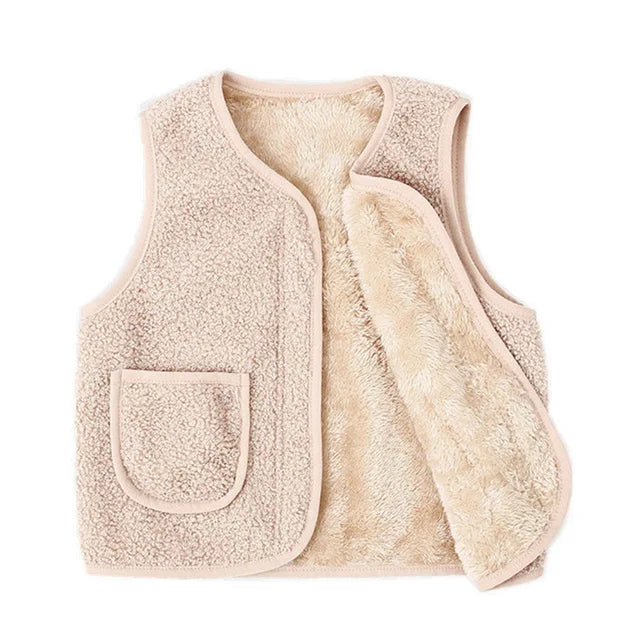 Title: Kids Wool-Look Vest - Warm Polyester

Handle: kids-wool-look-vest-warm-polyester

Description: Keep your little ones cozy and stylish with our Kids Wool-Look Vest! Made from warm polyester, it gives that soft lamb's wool feel without the itchiness. Perfect for chilly days at school or weekend adventures. Dress them up for fun while keeping them snug!

Variants: 
- Color: Gray
- Color: Blue
- Color: Pink

Get your kids ready for fun in the cold with this super comfy vest!