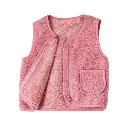 Title: Kids' Lambswool Look Vest - Cozy Polyester

Handle: kids-lambswool-look-vest-cozy-polyester

Description: Check out our Kids' Lambswool Look Vest! Made from warm polyester, this stylish gilet is perfect for keeping your little ones snug and comfy. It's great for chilly days and adds a touch of cool to any outfit. 

Variants: 
- Size: Small
- Size: Medium
- Size: Large

Snag this cozy vest for your kiddos today!