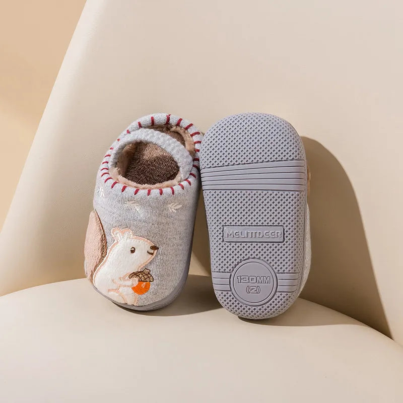 Title: Kids' Cartoon Design Slippers - Warm & Non-Slip Soft Material  
Handle: kids-cartoon-slippers-warm-non-slip  
Description: Keep your little ones cozy and stylish with these adorable kids' cartoon design slippers! Made from soft materials, they provide warmth and comfort while they play. Plus, the non-slip feature ensures your kids can run around safely without any slips or falls. Perfect for indoor adventures or lounging around the house!  
Variants:   
- Size 5 - Colorful Cartoon Design  