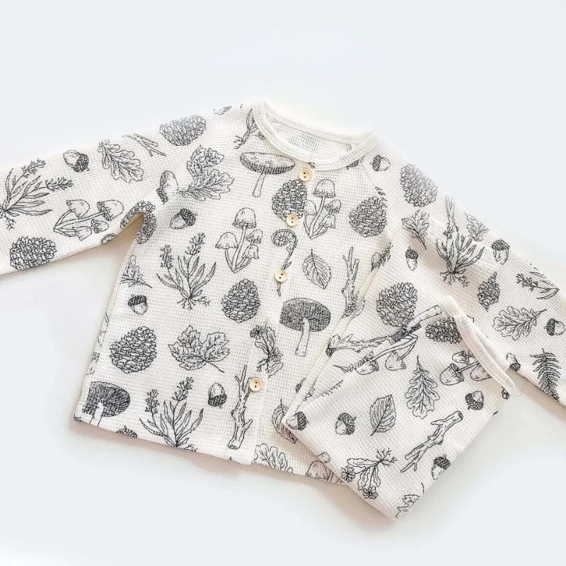 Title: Kids Pajamas - Breezy Cotton Comfort with Long Sleeves and Pants

Handle: kids-pajamas-breezy-cotton-long-sleeves-pants

Product Description: Get your little ones ready for cozy nights with our Kids Pajamas! Made from super comfy, breathable cotton, these PJs feature long sleeves and pants to keep them snug without overheating. Perfect for all-season wear, your kids will love the comfort they bring! 

Variants: 
- Size: 5 
- Color: Various options available 
- Material: Soft cotton