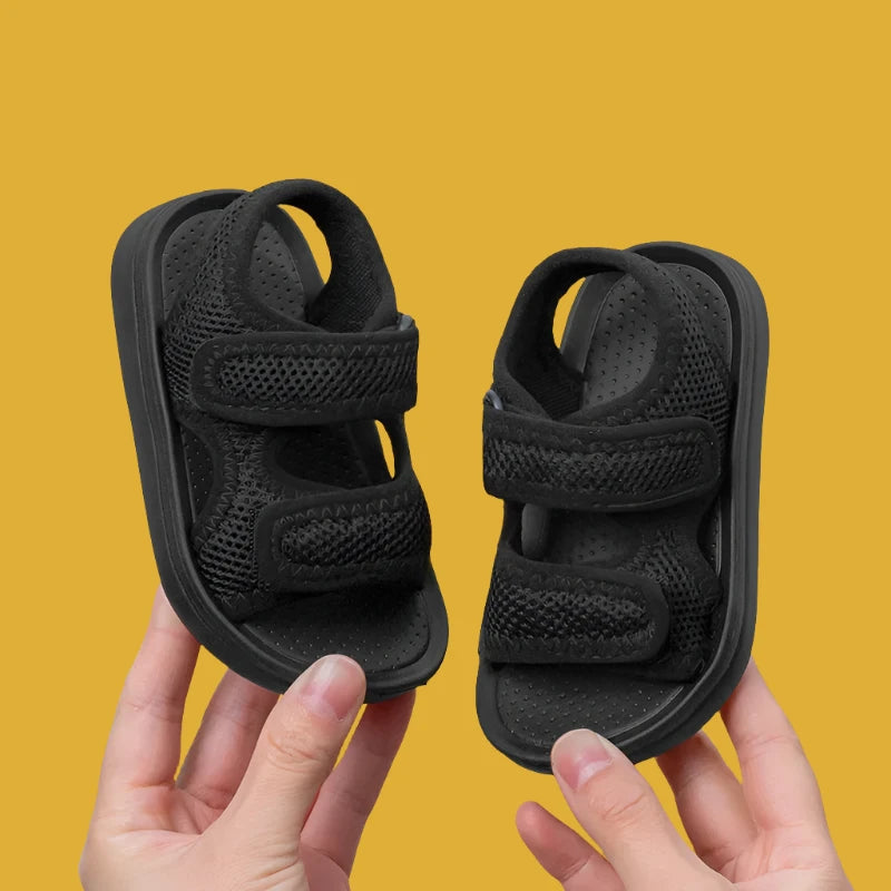Title: Kids Sandals - Soft Soles, Quick-Dry, Breathable, Lightweight  
Handle: kids-sandals-soft-soles-quick-dry-breathable-lightweight  
Description: Check out our awesome kids sandals! They feature soft soles for extra comfort, quick-drying material for those splashy adventures, breathable design to keep tiny feet cool, and they're super lightweight too. Perfect for a fun day out or a trip to the beach!  

Variants:  
- Size: 1 (Lightweight)  
- Size: 2 (Lightweight)  