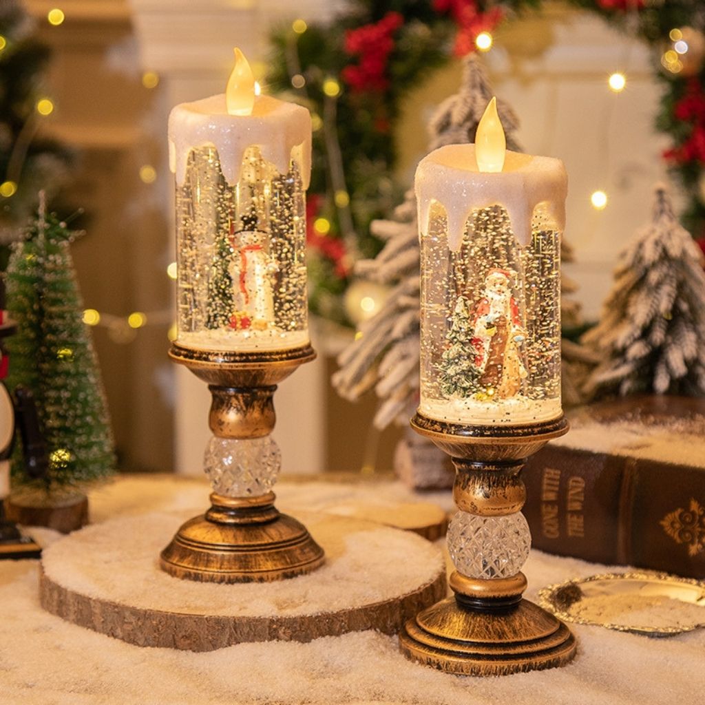 Tabletop winter lantern with clear chamber displaying illuminated festive scene