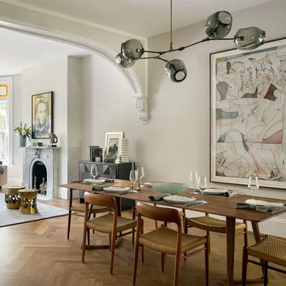 Sleek Glass Pendant Light With Modern Branching Arms