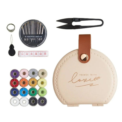 Travel sewing essentials kit displaying vibrant thread colors and professional sewing accessories in case

