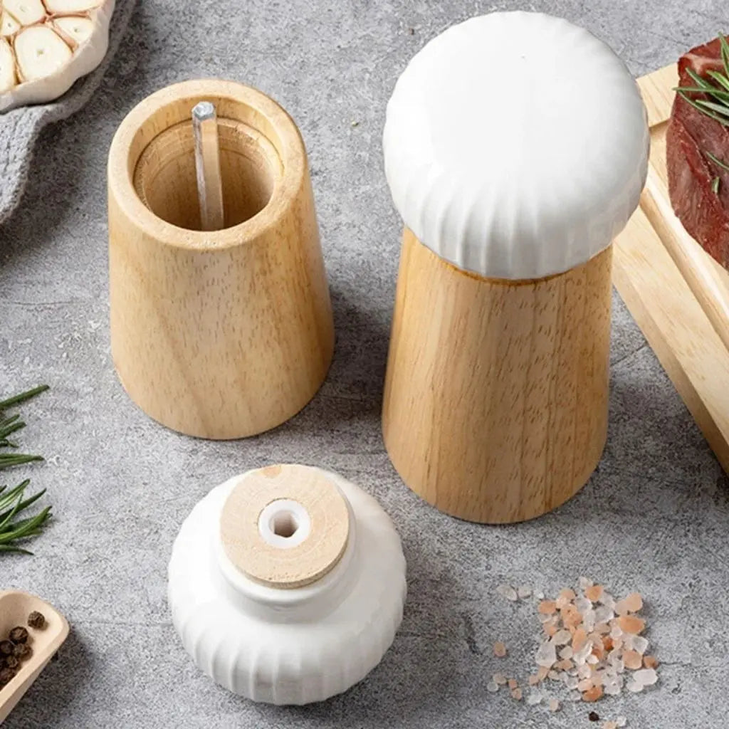 Manual spice mill combining ceramic grinding technology with wood construction for pepper preparation