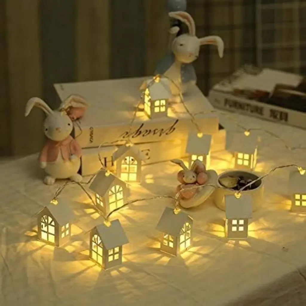 Nordic wooden house lights creating cozy bedroom decor with warm LED glow for holiday decorations