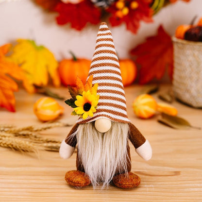 Polyester gnome dolls with tall patterned hats and long fabric beards in autumn colors