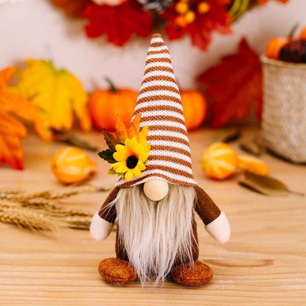 Harvest gnome figurines with sunflower details and fabric beards for tabletop display