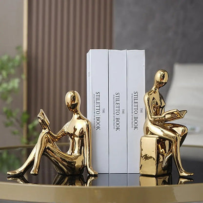  Decorative ceramic book holders featuring artistic reading figures perfect for stylish book storage
