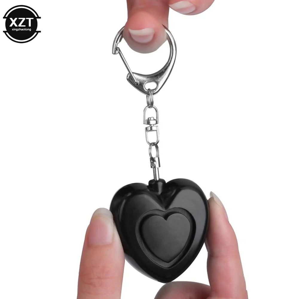 Safe Personal Alarm for Women – 130 dB Keychain with LED Emergency Light for Self-Defense and Protection 7