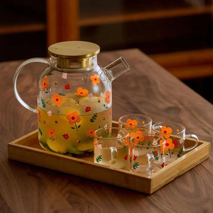 Modern sunflower borosilicate glass tea kettle set with contemporary teaware design