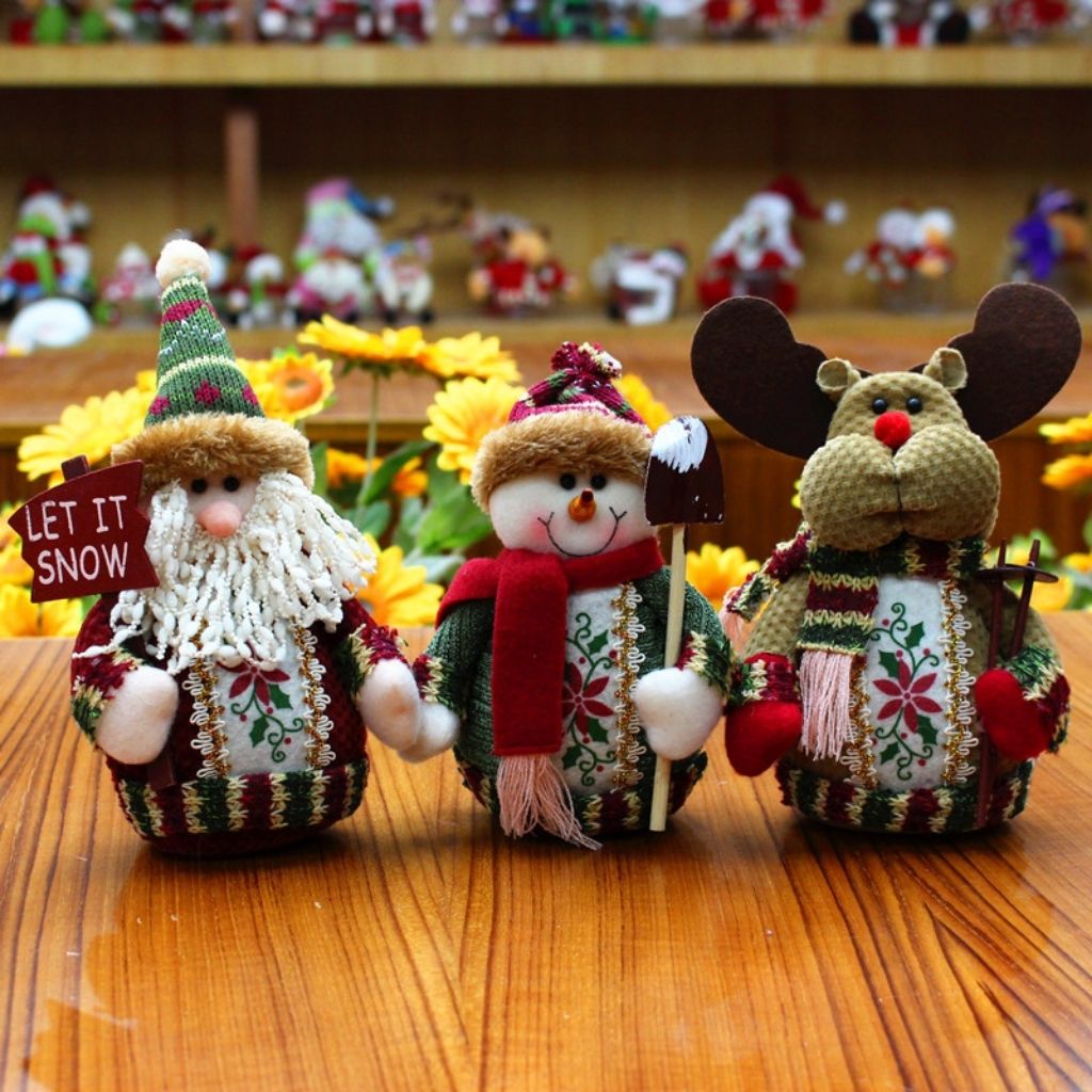 Festive mantel decor figurine with handcrafted embroidered design