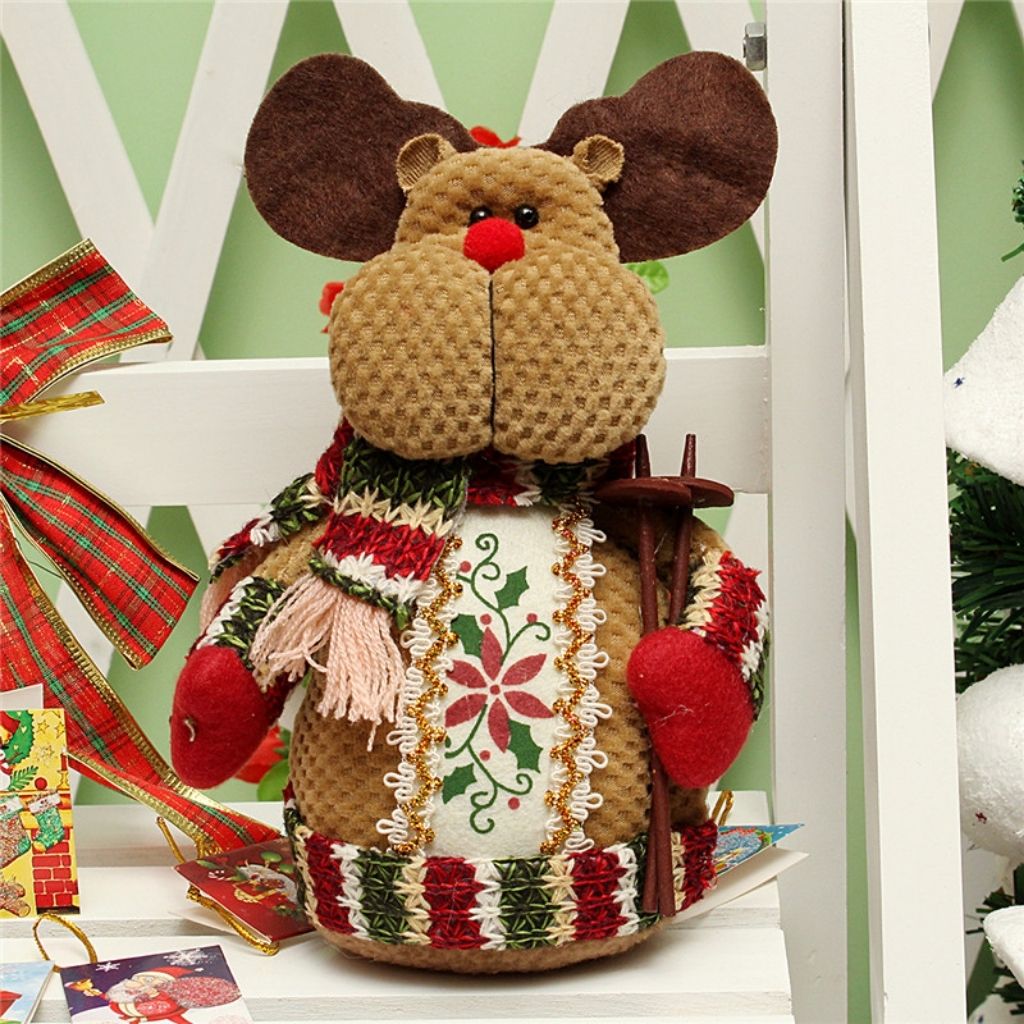 Plush tabletop ornament with weighted base standing upright on flat surface