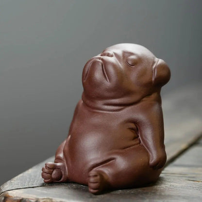 Cute handmade clay dog tea pet figurine ideal for tea rituals and as charming desk ornament