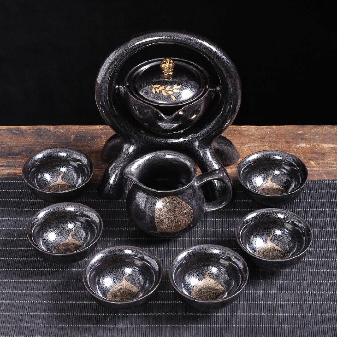 Modern ceramic tea set with automatic rotating teapot for home entertaining