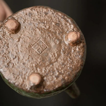 Ceramic teapot spout with bronze glaze finish designed for precise tea pouring and serving