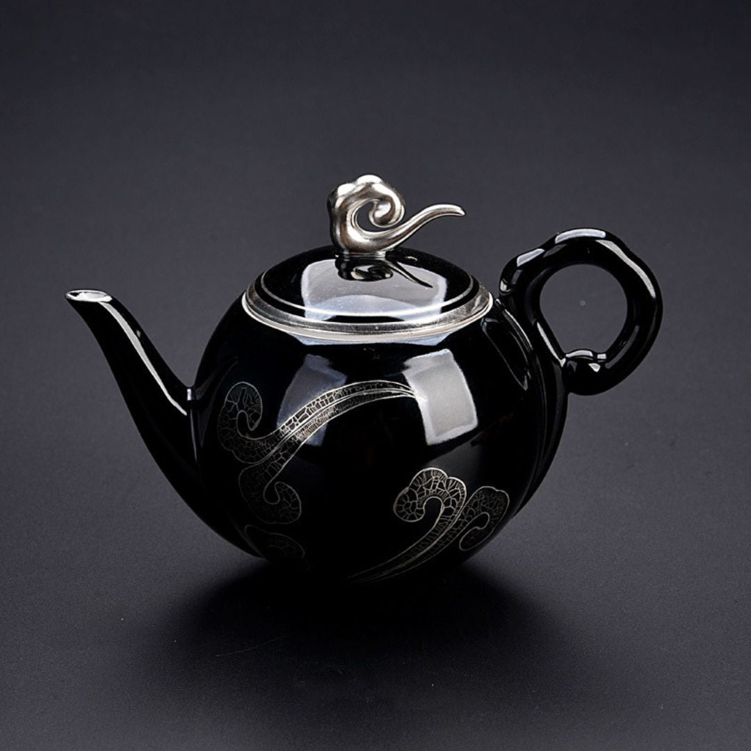 Black ceramic brewing pot with precision spout for loose leaf tea steeping