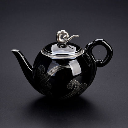 Black ceramic brewing pot with precision spout for loose leaf tea steeping