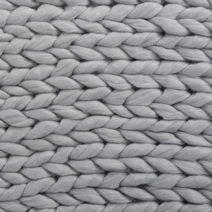  Chunky knit blanket with thick textured weave perfect for draping over sofa or chair