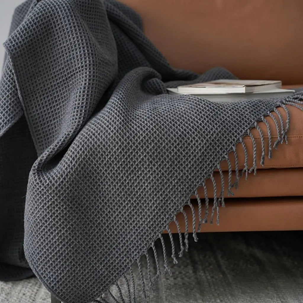 Bamboo fiber coral fleece blanket in neutral tone for lightweight modern home comfort