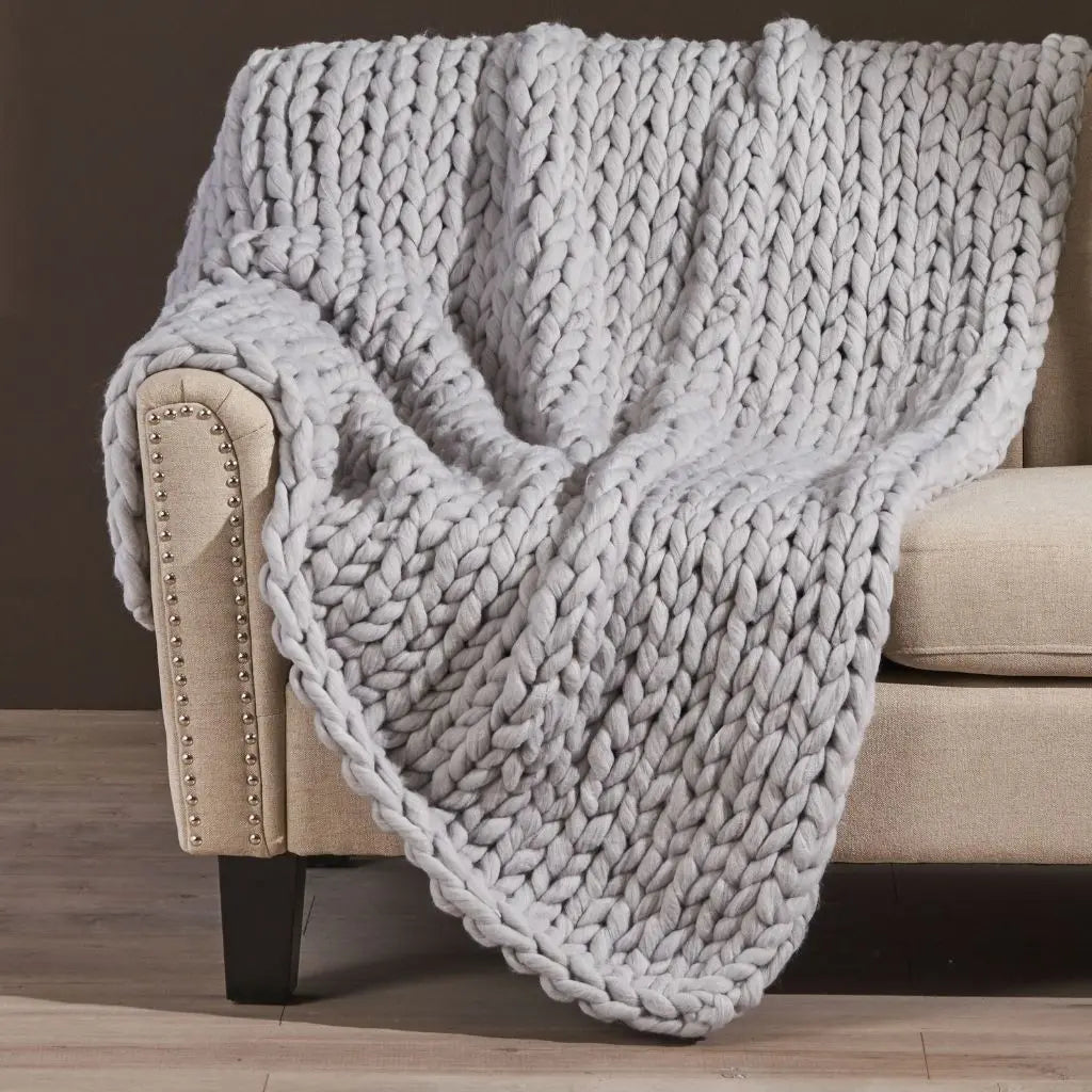  Chunky knit throw with textured acrylic fabric ideal for reading nooks and living spaces