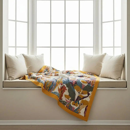 Floral print cotton quilt with colorful botanical design and nature inspired patterns